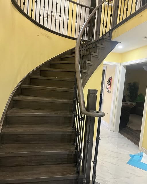 Oak staircase renovation with new treads in Brampton